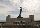 terry fox monument with sunny and cloudy sky behind